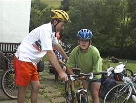 Michael helps Gavin remove his handlebars so he can check his headset bearings